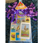 Gift bag with purple ribbon curls and a Lotería card set