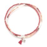 Pink and peach beaded wrap bracelet with small tassel and silver charm