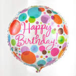 Round birthday balloon with colorful polka dots and pink text