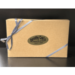 Box of Dorothy Cox's chocolates tied with blue ribbon