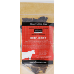 Bag of beef jerky treats with a red label