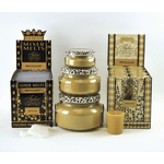 Three scented candles in glass jars with matching boxed packaging