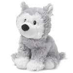 Gray and white plush wolf stuffed animal sitting upright