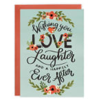 Floral greeting card reading "Wishing you love, laughter and a happily ever after."
