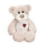 Plush teddy bear with a small heart on its chest