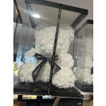 White rose teddy bear in a clear display box with black ribbon