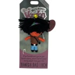 Small novelty voodoo doll keychain on a card labeled Banish Bad Luck