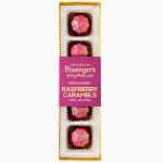 Box of raspberry caramel chocolates in pink wrappers