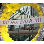 Yellow floral wreath with a ribbon reading West Point Class of 1989