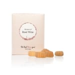 Box of rosé wine flavored gummies with several candies in front