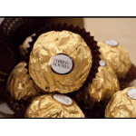 Ferrero Rocher chocolates wrapped in gold foil