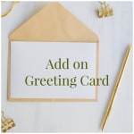 Greeting card in a kraft envelope with gold pen and clips