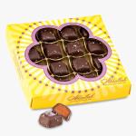 Box of chocolate candies with one piece outside the package