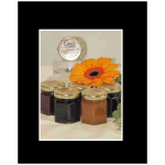 Jars of jam with an orange gerbera daisy