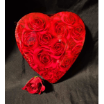 Heart-shaped box filled with red roses, with a single rose below it