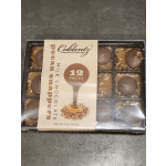 Box of pecan snapper milk chocolates in plastic tray