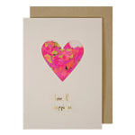 Greeting card with a pink confetti heart and gold text