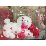 White teddy bear in a clear gift box with pink heart decorations