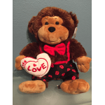 Plush monkey holding a heart that says Love