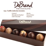 Box of six assorted chocolate truffles with a branded lid