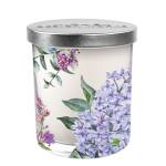 Floral-scented candle in a clear glass jar with a silver lid