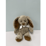 Plush bunny with floppy ears and a white ribbon bow