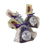 Four bagged bundles of dried lavender tied with purple ribbons