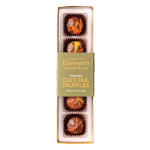 Box of assorted cocktail truffles in clear packaging