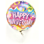 Round foil balloon reading Happy Anniversary