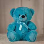Blue teddy bear with a satin ribbon bow