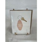 Greeting card with a key and tag that says Happy New Home