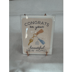 Greeting card reading congrats on your beautiful new home