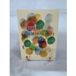 Birthday card with colorful balloon illustrations and the words "Happiest of Birthdays to you!"