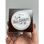 Small box labeled Dubai Chocolate Milk held in a hand