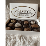 Box of assorted chocolates in paper cups