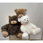 Three plush teddy bears in brown, tan, and white