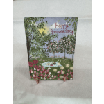 Anniversary card with a garden picnic scene and pink flowers