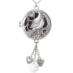 Round silver locket necklace with bird and flowers and dangling heart, flower, and crystal charms