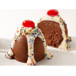 Chocolate dessert domes topped with white icing, sprinkles, and cherries