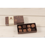 Box of assorted chocolates with the lid beside it