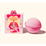Pink bath bomb beside a pastel box with a cartoon cowgirl