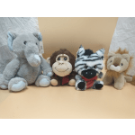 Four plush animals seated side by side, including an elephant, monkey, zebra, and lion