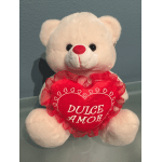 White teddy bear holding a red heart with the words "Dulce Amor"