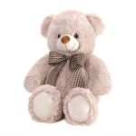 Plush teddy bear with a striped bow on a white background