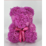 Pink rose teddy bear with a ribbon bow