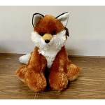 Plush fox toy sitting on a wooden floor