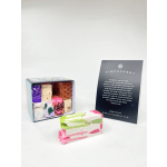 Boxed colorful soap bars with a product card