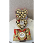 Heart-shaped boxes of Ferrero Rocher chocolates on a table