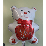 White teddy bear balloon holding a red heart that says I Love You