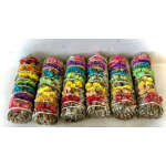 Bundles of dried multicolored flowers tied with string